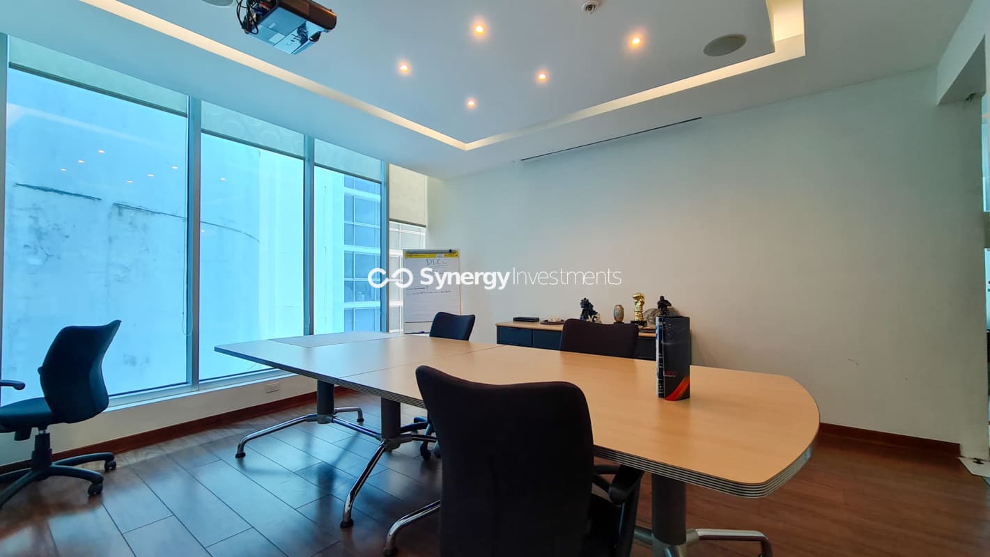 Spacious conference room with city skyline backdrop in BICSA Tower Panama