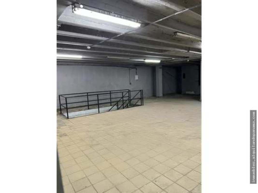 Wide open basement warehouse area with columns and tiled floors Calidonia Panama City