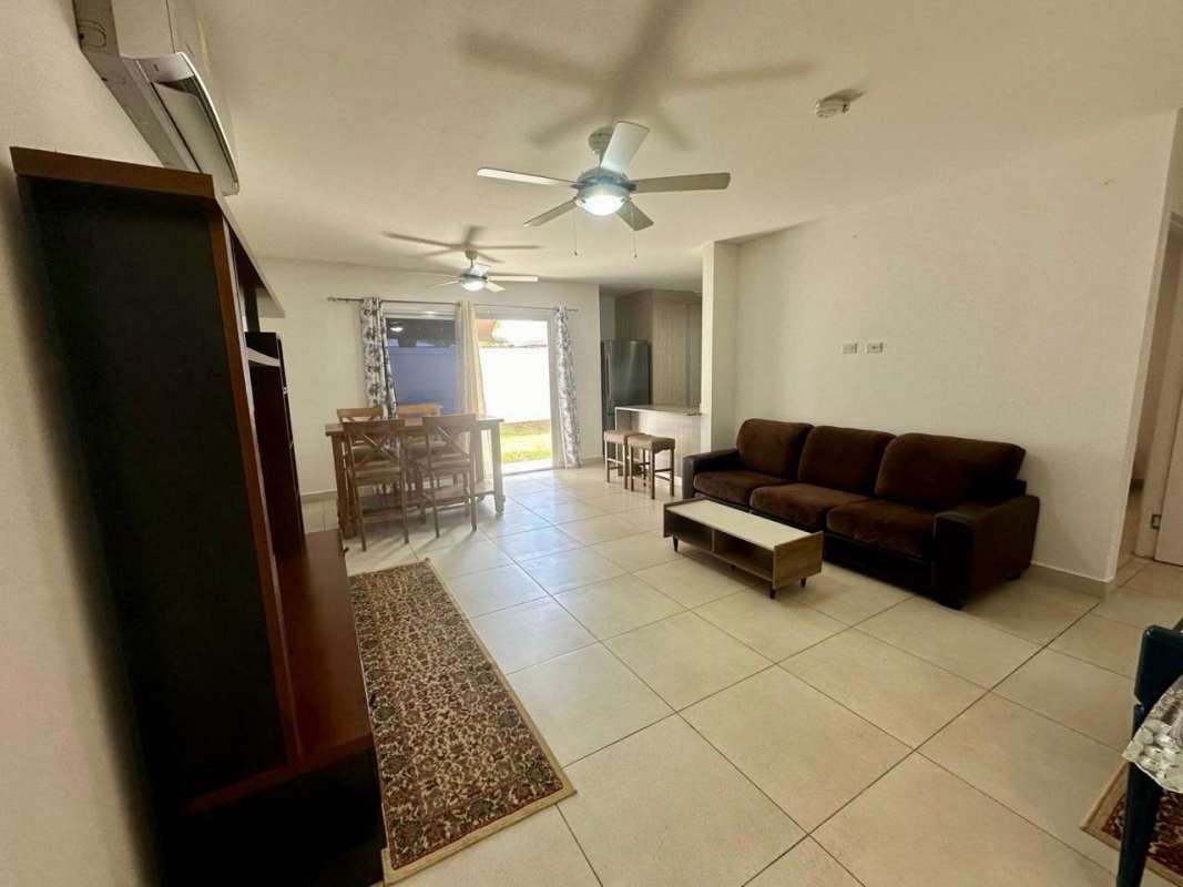 Spacious modern living and dining area with natural light Costa Sur house Panama