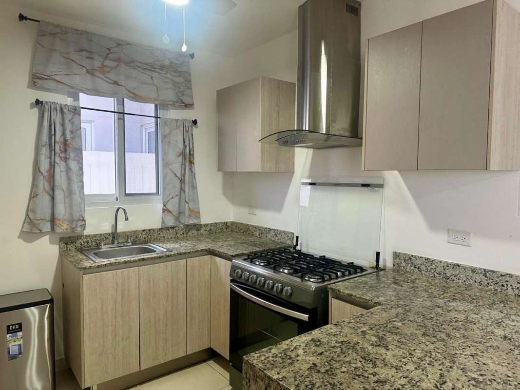 Contemporary bathroom with glass shower and vanity in Costa Sur rental Panama