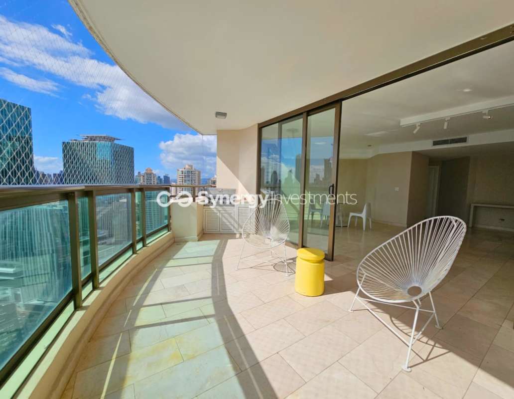 Modern bathroom with dual sinks, marble countertop, glass shower PH Ocean View Panama