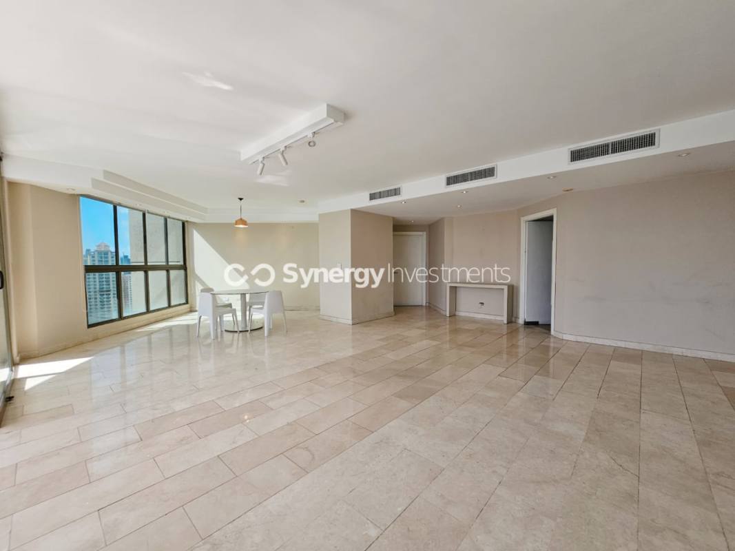 Modern kitchen with granite countertops, stainless appliances, marble floor in PH Ocean View Panama