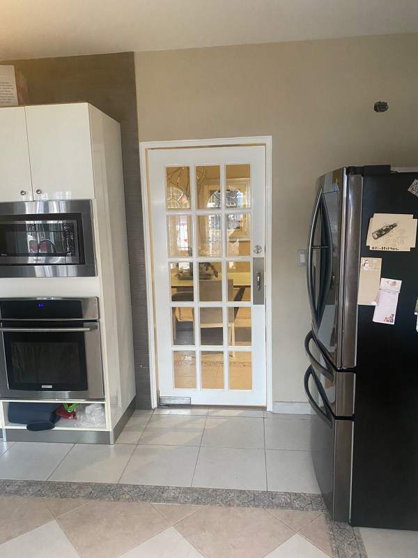 Modern kitchen with granite counters, cabinets in house for sale Altos del Chase Panama