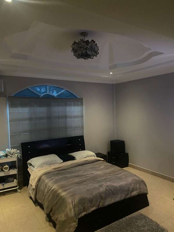 Living room with neutral tones in 4BR house for sale Altos del Chase Panama