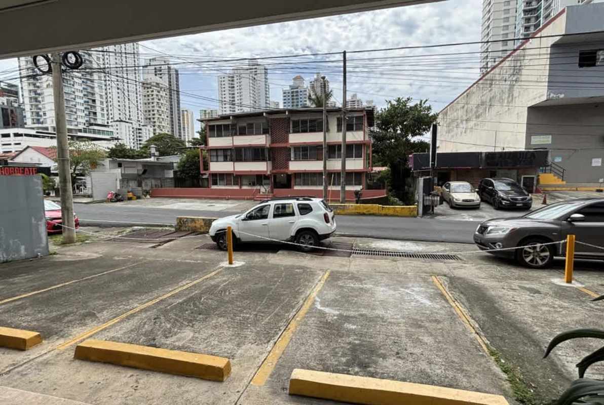 Busy San Francisco intersection with PH Plaza Real commercial units visible Panama