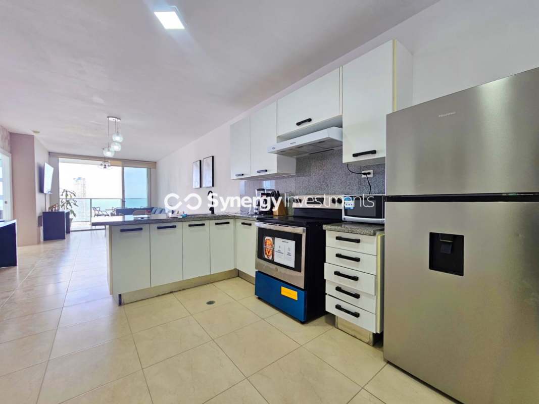 Luxurious infinity edge pool with city and Pacific Ocean views at PH BICSA Avenida Balboa Panama