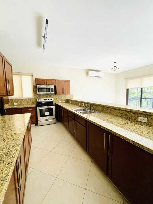 Balcony overlooking lush gardens Embassy Club Clayton luxury apartment for rent