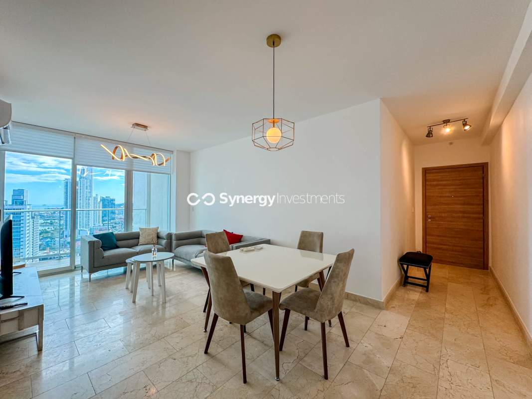 Contemporary kitchen with appliances, marble floors, and open design in Dynasty Residences