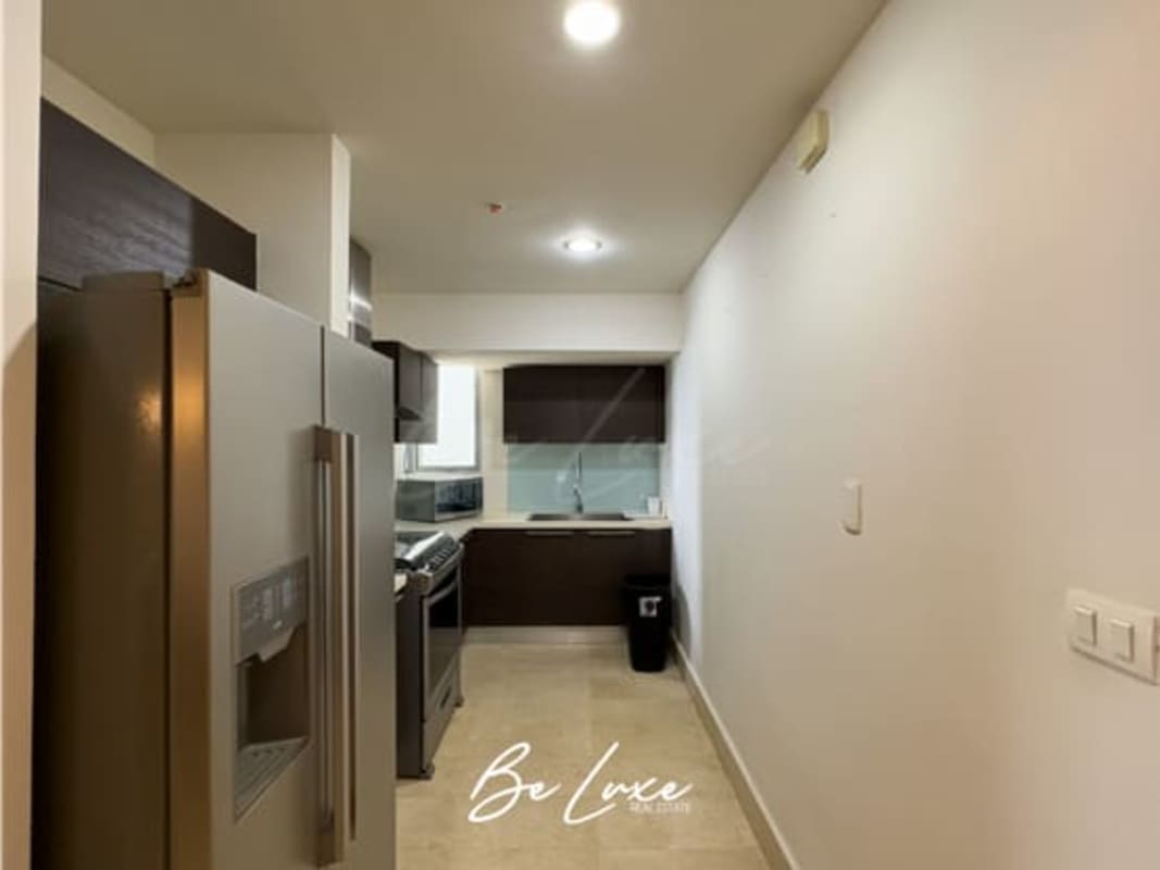 Luxurious master bedroom with panoramic ocean views and marble floors in PH Yoo Avenida Balboa Panama