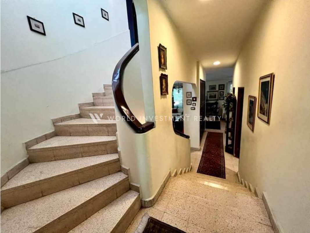 Kitchen area with window and cabinetry in house for sale Hato Pintado Panama