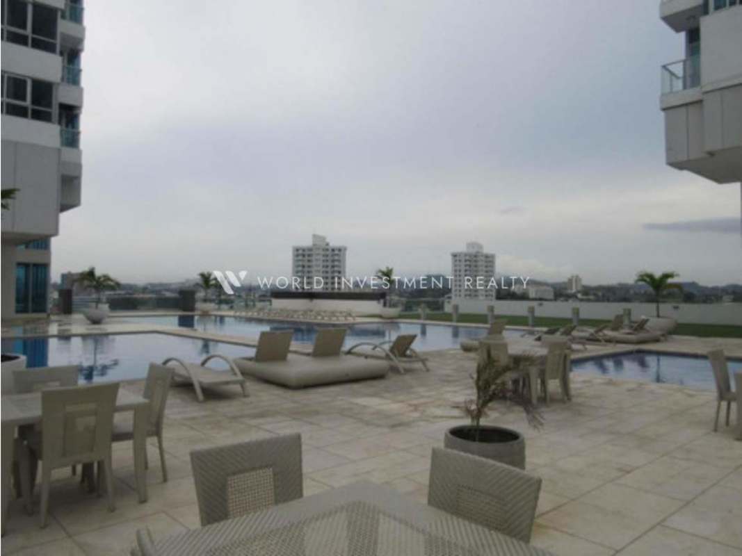 Spacious living room with sectional sofa and city views PH Top Tower Panama