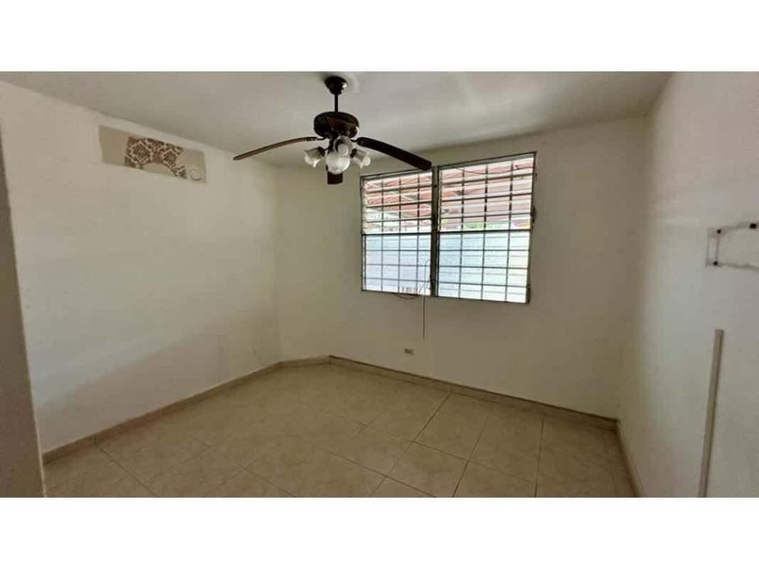 Large fenced rear garden area in Brisas del Golf home with expansion potential