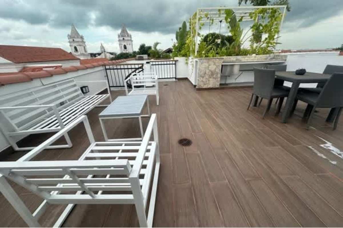 Rooftop terrace with panoramic views of Panama Bay, city skyline, seating at PH Casa Panamá Casco Viejo