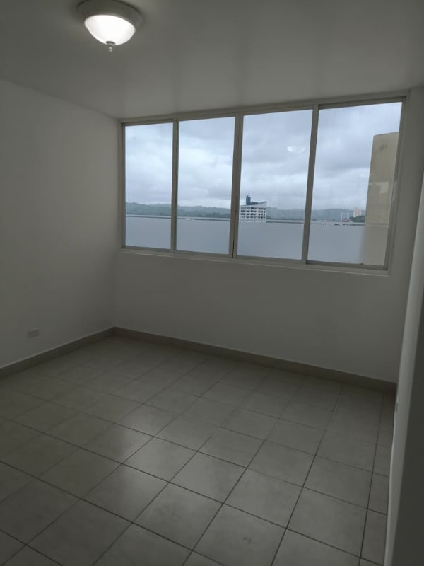 Bedroom featuring window and tiled floor PH Edison Plaza Panama City
