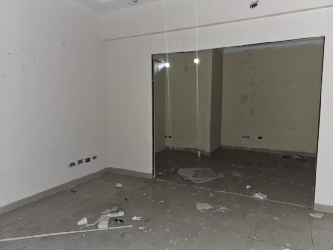 Front facade with multiple glass storefronts for commercial spaces available in Marbella Panama