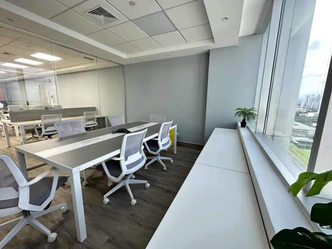 Grand commercial lobby with escalator and glass dome in Torre Las Américas Punta Pacífica Panama