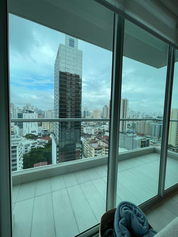 Built-in illuminated shelves floating console mounted TV PH Urbana furnished Obarrio