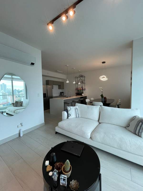 Spacious modern open-plan living and kitchen city view windows PH Urbana Obarrio