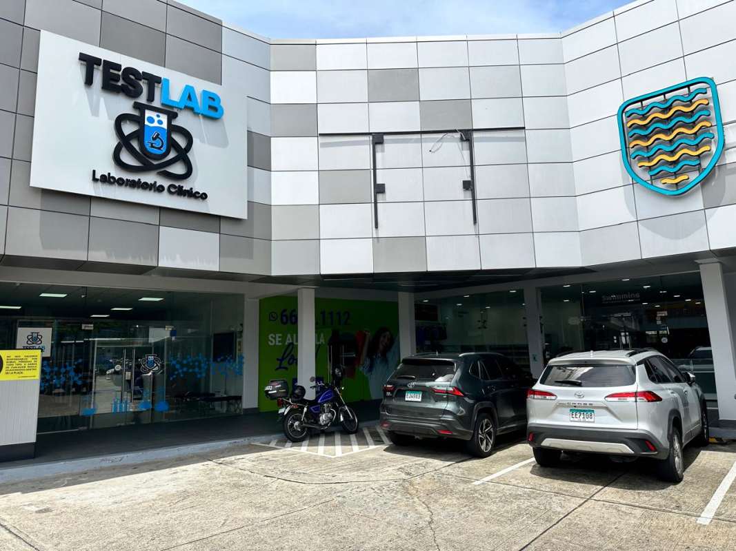 Front view of City Plaza El Dorado with multiple retail units, parking and signage in Panama City