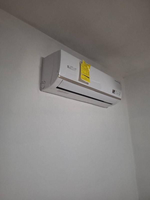 Kitchen with tile floor, granite countertops, microwave oven, dark cabinets in PH Cosmopolitan Tower Panama