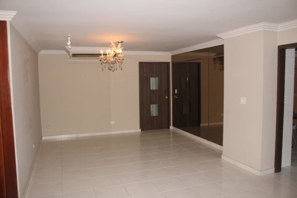 Contemporary kitchen with granite, wood cabinets, dual sink in PH La Fontana Panama