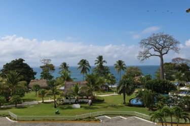 Spacious living room opening to oceanview terrace in PH Balboa Bijao condo Panama