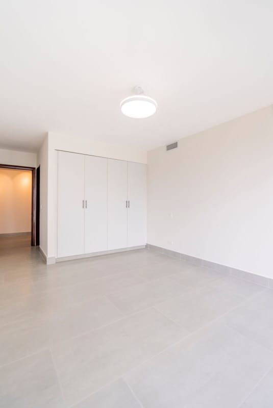 Contemporary kitchen in PH Ocean Aire apartment with granite counters, stainless appliances, tile backsplash in Punta Pacifica Panama