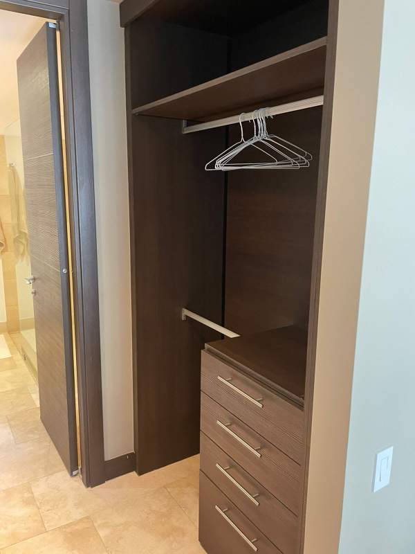 Modern granite kitchen with dining area in luxury condo Punta Pacifica Panama