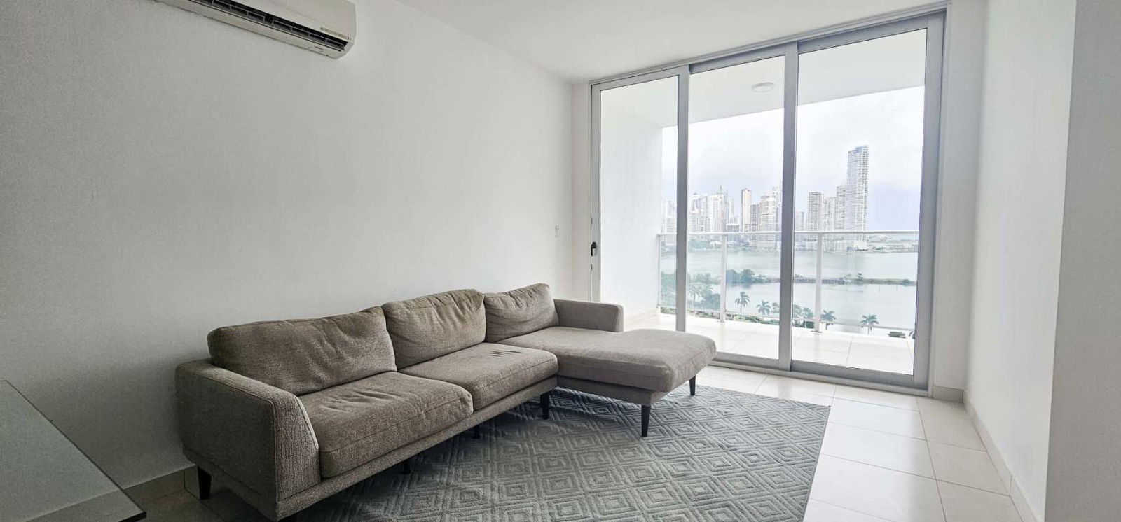 Large bedroom with floor to ceiling windows ocean view PH White Tower Panama