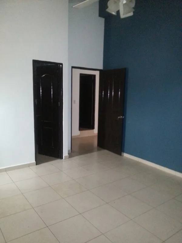 Bathroom with jacuzzi bathtub blue yellow tiles Villa de las Fuentes Panama