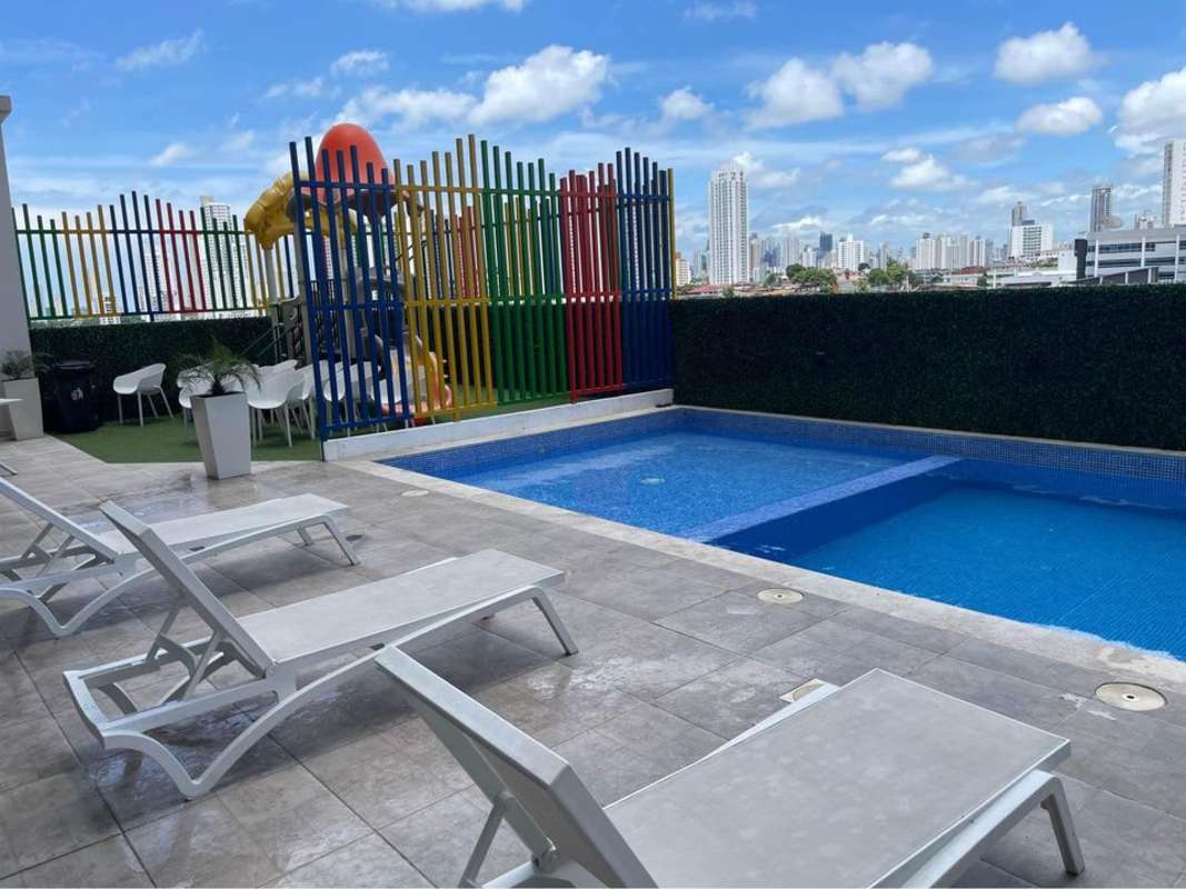 Modern multi-story building with retail on ground floor and apartments above PH Studio 12 Panama City