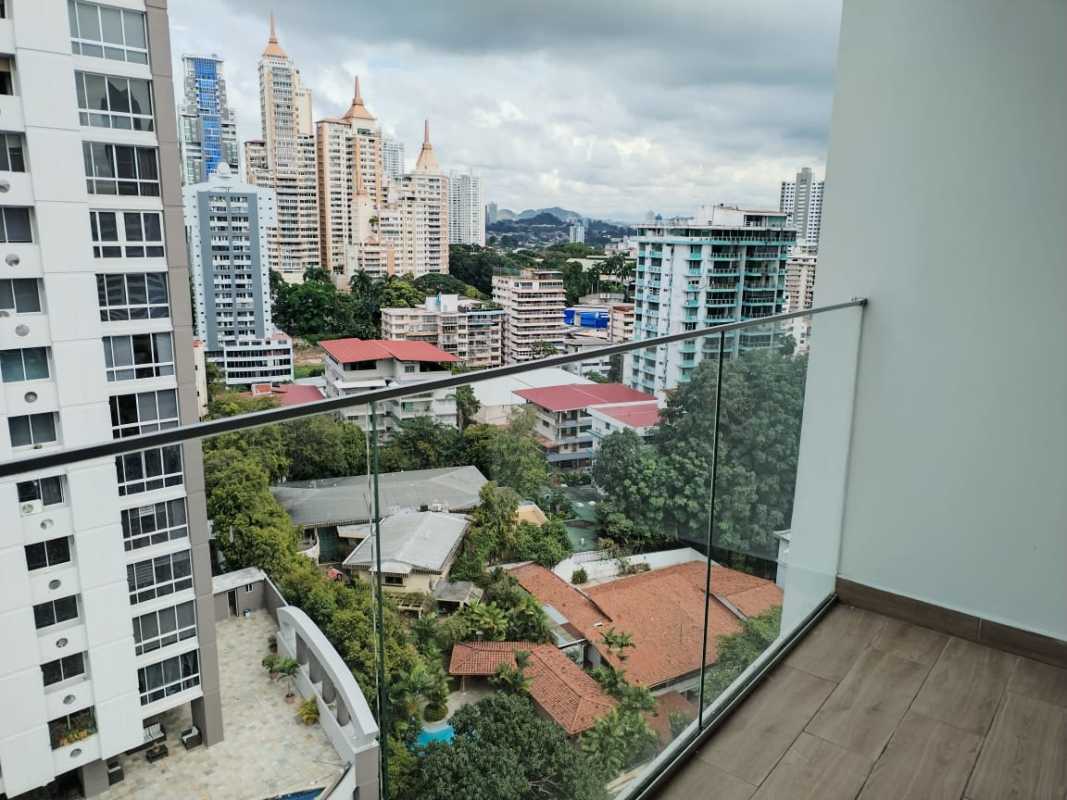 Contemporary bathroom glass enclosure, brown wall tiles PH Sky Swiss El Cangrejo Panama