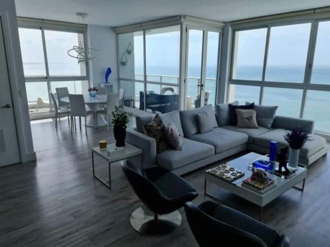 Spacious modern living dining room ocean view floor-to-ceiling windows PH Pacific Point Panama