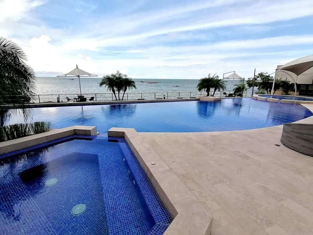 Infinity pool with Pacific Ocean backdrop luxury amenities PH Pacific Point Panama