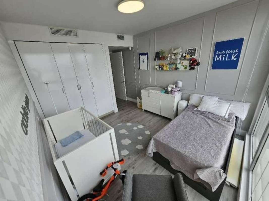 Bright nursery child’s bedroom built-ins ocean view PH Pacific Point Panama