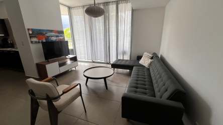 Dining space integrated with living room, large windows PH Mosaic Panama Pacifico