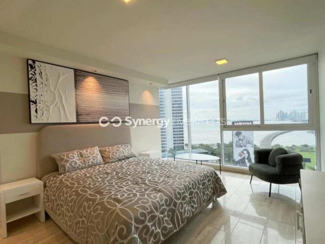 Luxury master bedroom with ocean views, walk-in closet, marble floors in Costa del Este