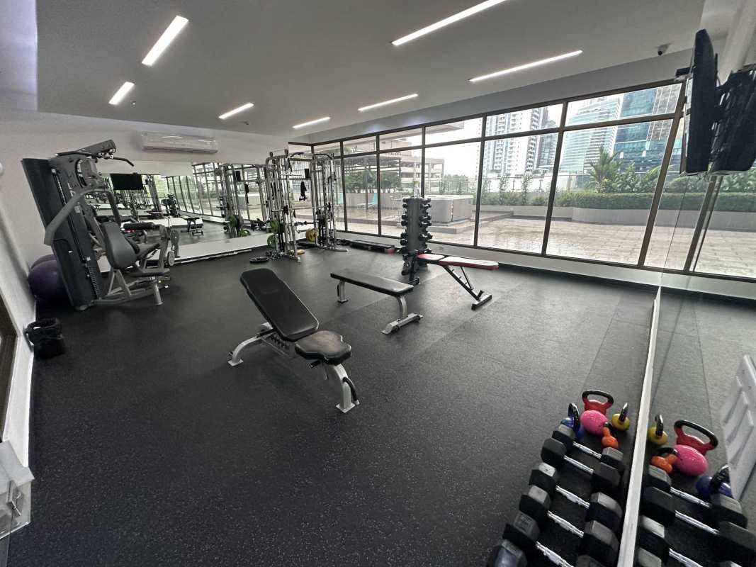 Elegant double-height lobby with designer furniture in PH Costa del Este Panama City