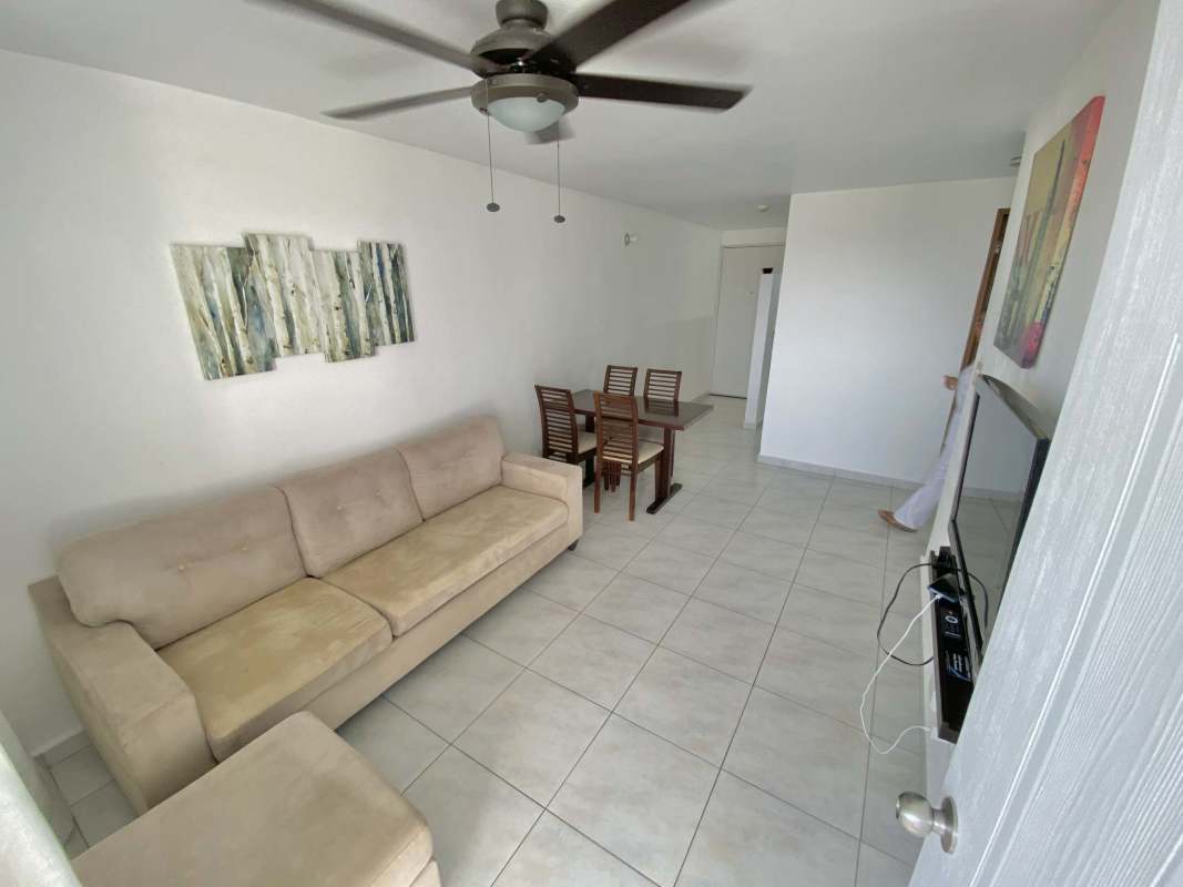 Compact bathroom with glass shower pedestal sink tiled floor in Llano Bonito Park Panama