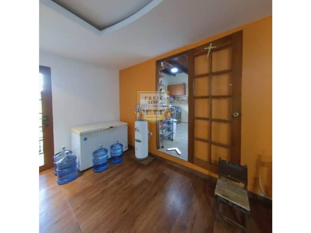 Panama house kitchen with wood cabinets stove tile floors for sale in Bethania area