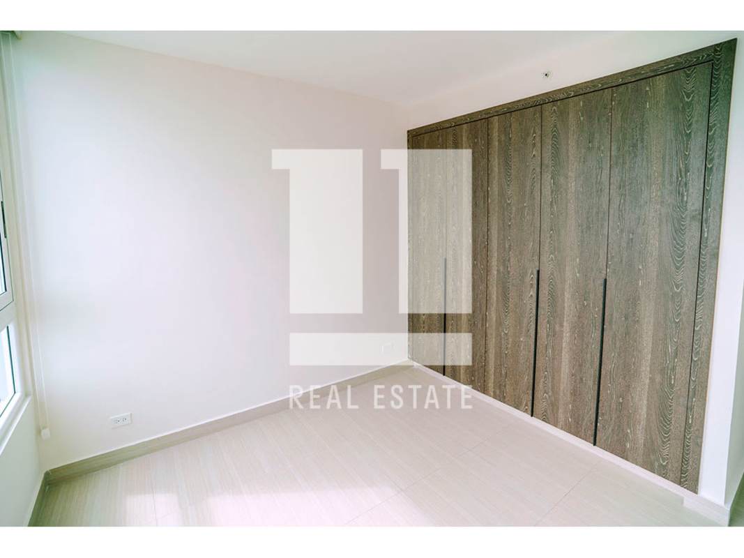 Master bedroom with panoramic window ocean view in PH Asia Costa del Este Panama