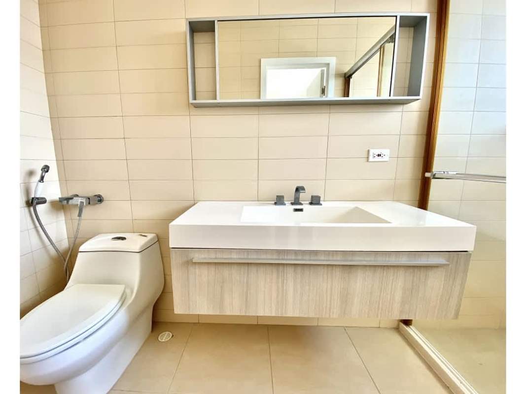 Contemporary kitchen with granite countertops in luxury apartment PH Waters on the Bay Panama