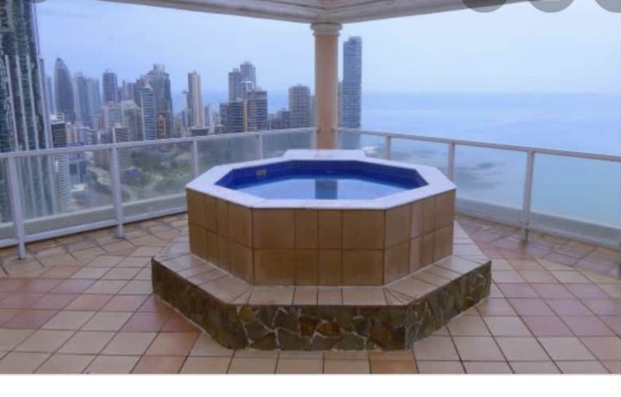 Terrace balcony with hot tub overlooking Pacific Ocean and skyline at PH Vista del Mar Avenida Balboa Panama