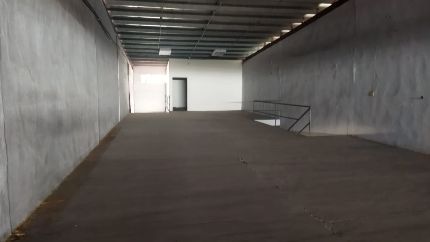 Warehouse mezzanine with metal ceiling and small enclosed storage office Panama