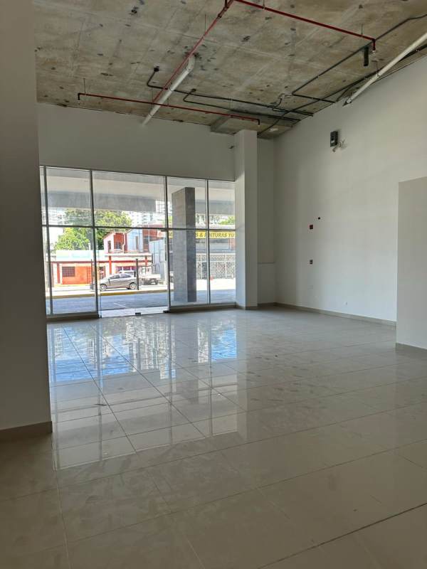 Bright commercial space with floor-to-ceiling windows and tile floor located in Parque Lefevre Panama City