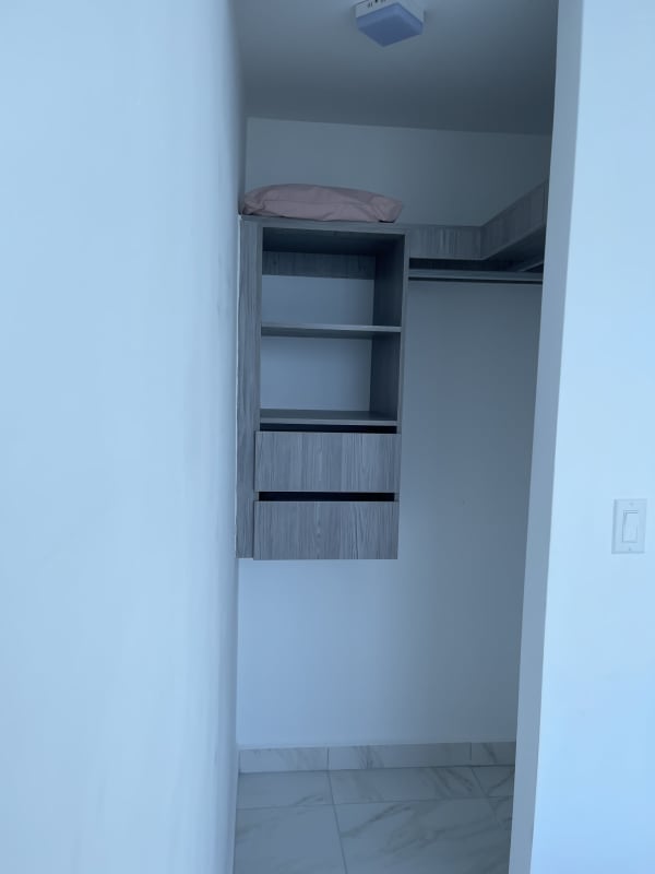 Compact modern kitchen with granite counters and appliances PH Marina Vista Panama City