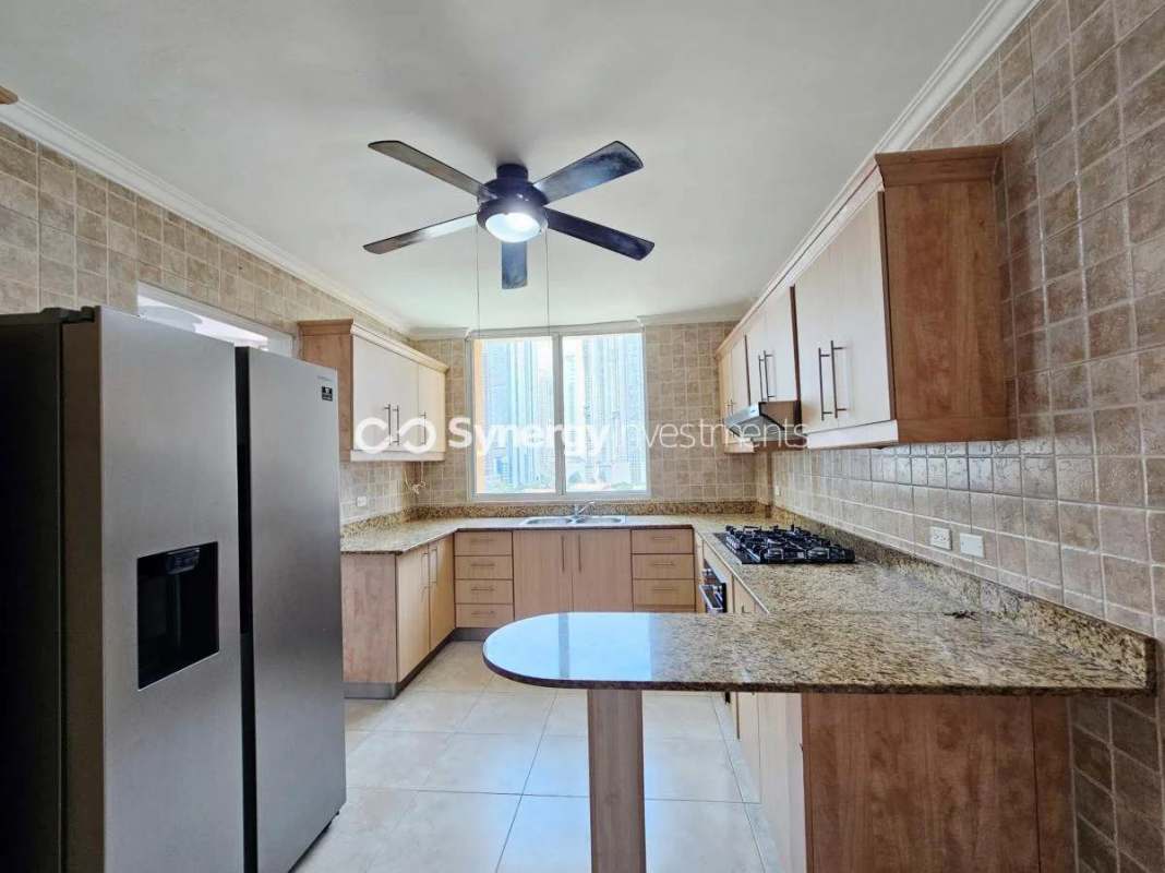 Open-plan living dining room with porcelain floors large balcony access PH Pacific Point Panama