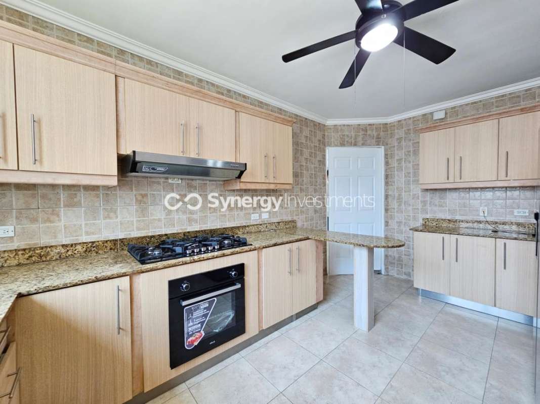 Bright bedroom with large window skyline view split AC built-in closet PH Pacific Point Punta Pacifica