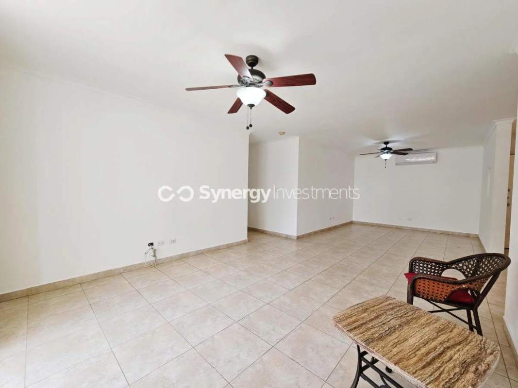 Contemporary kitchen granite countertops wood cabinetry in PH Pacific Point luxury apartment Punta Pacifica Panama