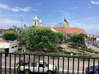 Scenic panorama from balcony towards main plaza and Cathedral San Juan Bautista Chitré Panama